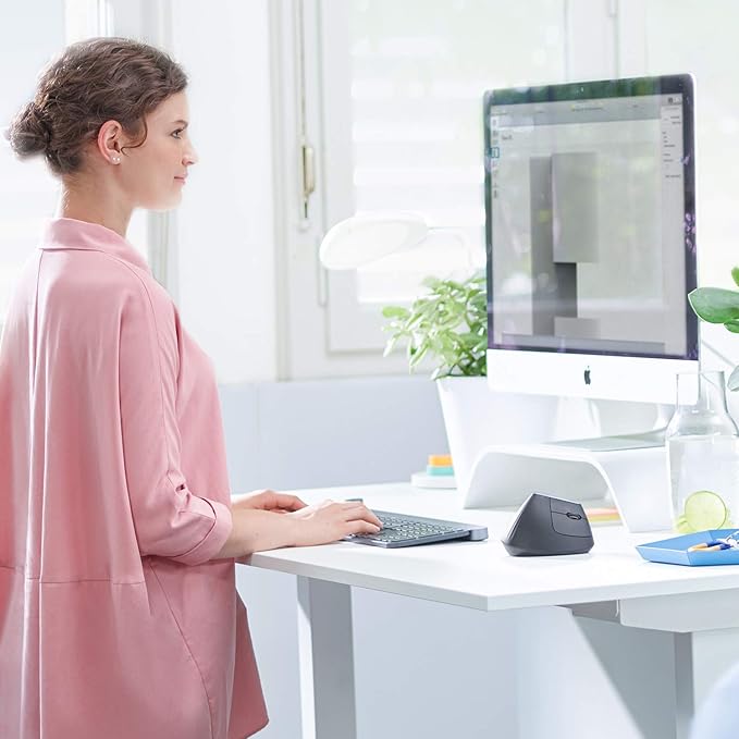 Logitech MX Vertical Wireless Mouse – Ergonomic Design Reduces Muscle Strain, Move Content Between 3 Windows and Apple Computers, Rechargeable, Graphite
