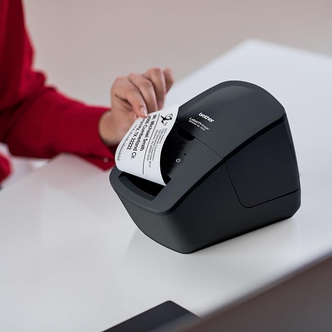 Brother QL-600 Desktop Monochrome Label Printer, up to 2.4" Label Width, No Ink Required, uses Brother Genuine DK Drop-in Rolls for Fast Labeling and Easy Integration with Microsoft Applications