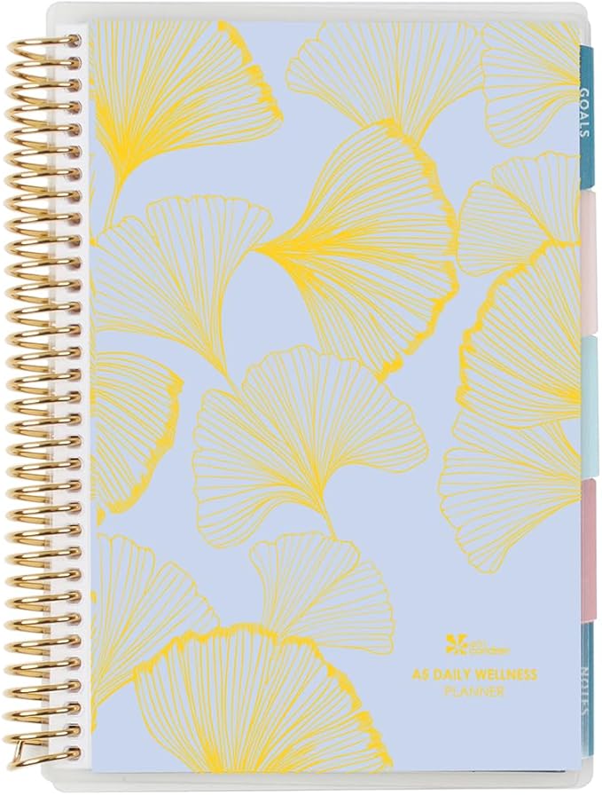 A5 Spiral - Bound Wellness Planner. 3 Months of Planning Pages. Daily Food, Movement, and Self-Care Trackers. Reflection and Celebration Pages. 6 Tabs. Sticker Sheet Included by Erin Condren.