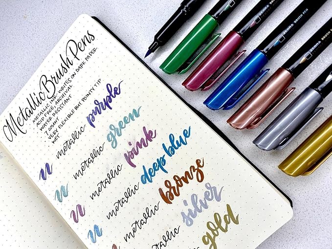 Zebra Pen, Metallic Brush Pens, Assorted Metallic Ink Colors, Medium Brush Tip Mimics Artist’s Paint Brush for Calligraphy, Acid-Free Ink for Light and Dark Paper, 7-Pack (01607)