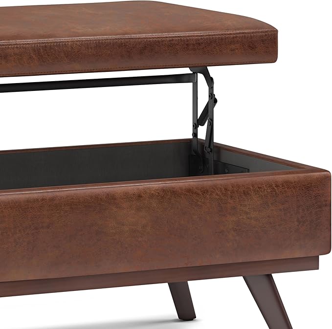 SIMPLIHOME Owen Lift Top Coffee Table Storage Ottoman - 42 inch Wide Upholstered Vegan Leather Rectangular Lift-Top Ottoman in Distressed Saddle Brown, Mid-Century Modern Ottoman for Living Room