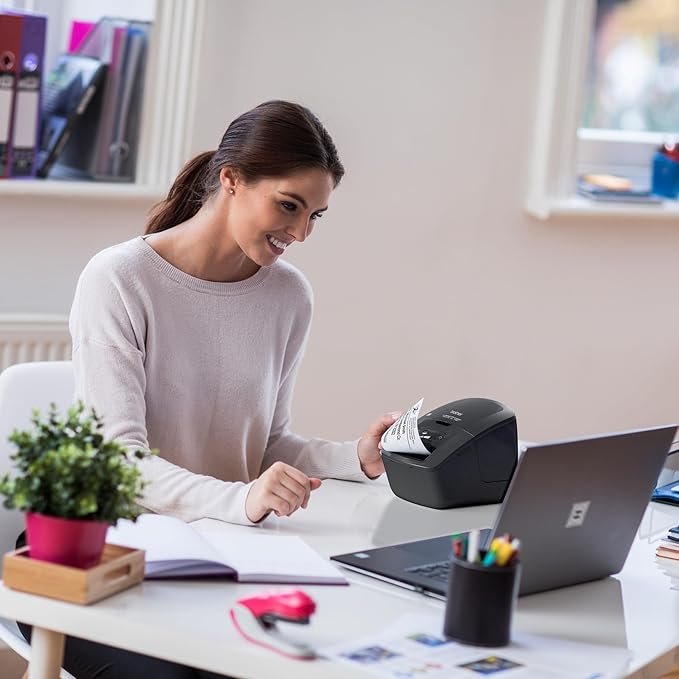 Brother QL-600 Desktop Monochrome Label Printer, up to 2.4" Label Width, No Ink Required, uses Brother Genuine DK Drop-in Rolls for Fast Labeling and Easy Integration with Microsoft Applications